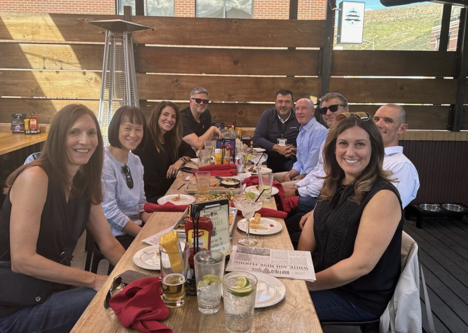 A group of people sitting at a table

Description automatically generated